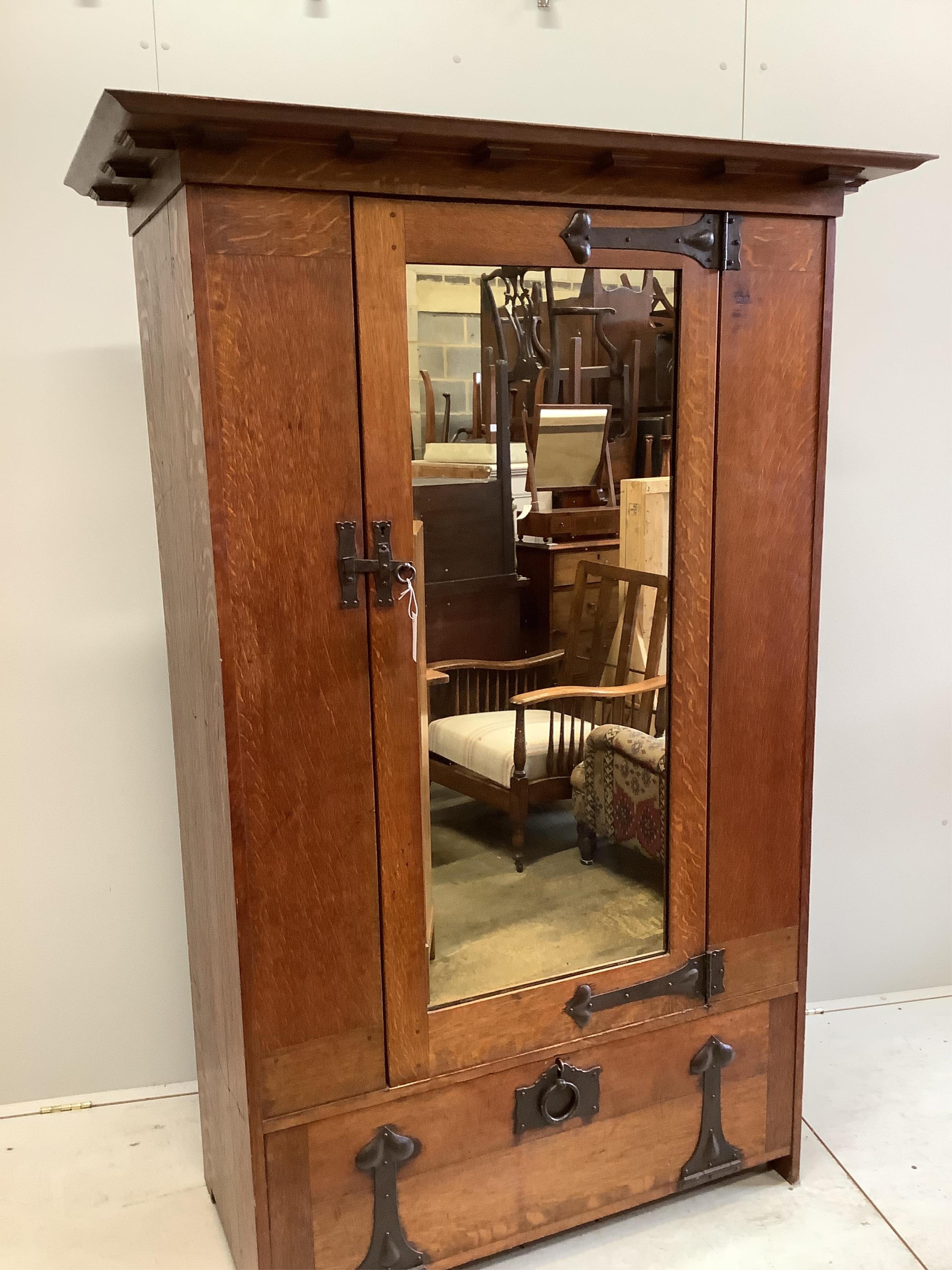 Ambrose Heal (1872-1959) for Heal & Son, London. A 'St Ives' oak wardrobe, c.1898, width 128cm, depth 61cm, height 189cm. Condition - good